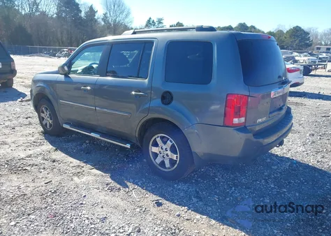 2009 Honda Pilot Touring z USA, uszkodzony, nr VIN 5FNYF48989B020930